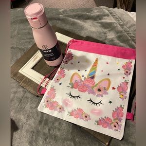 Unicorn pull bag and Pink water bottle.